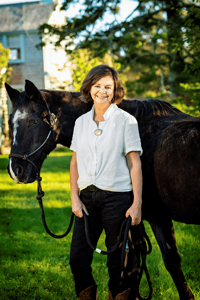 Photograph of Geraldine Brooks with a Horse